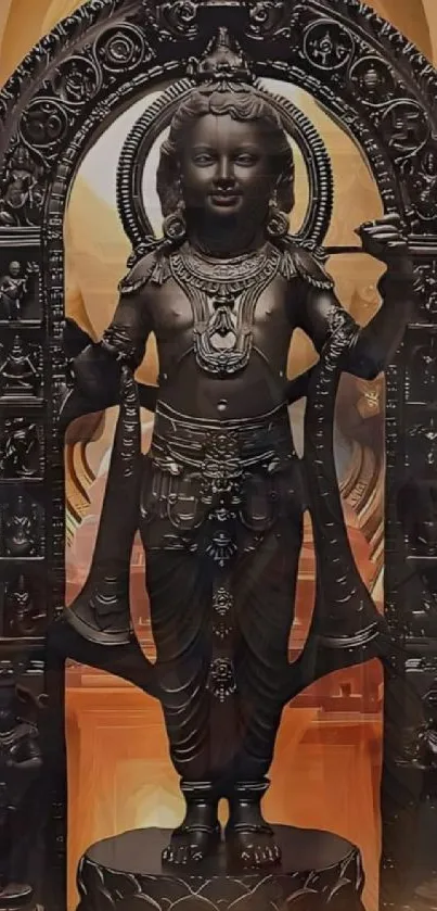 Intricate black statue with ornate design set against a warm backdrop.