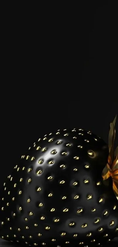 Black strawberry with golden accents on a dark background.