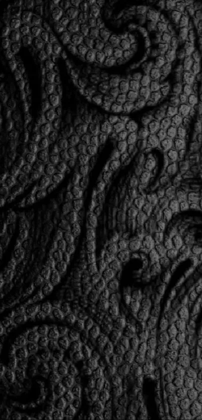 Elegant black mobile wallpaper with textured swirling patterns.