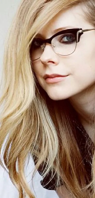 Portrait of a blonde woman with glasses in an elegant style.