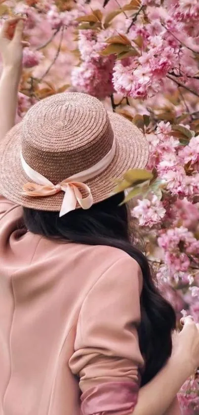 Woman in hat with cherry blossoms mobile wallpaper.