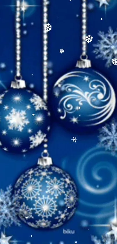 Blue Christmas ornaments with snowflake designs.