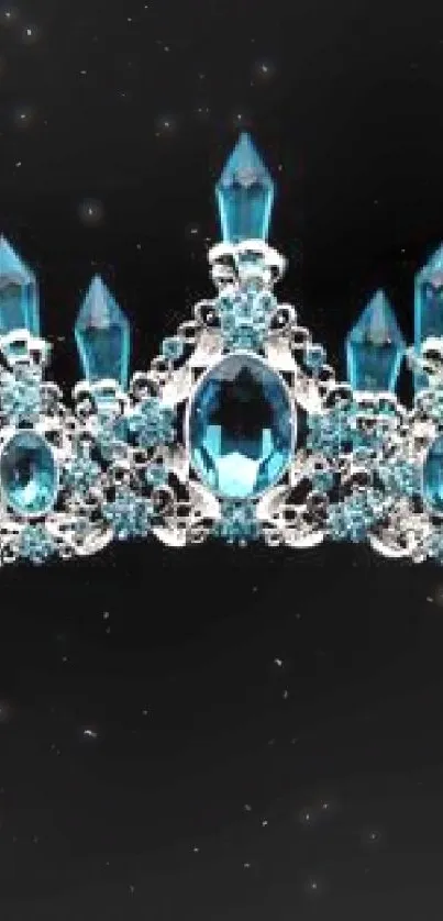 Blue jeweled crown against a black background.