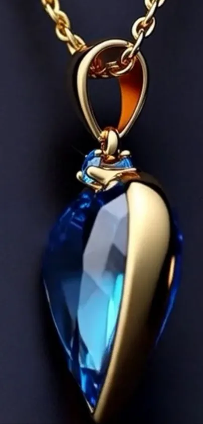 Elegant blue gemstone pendant on gold chain wallpaper.