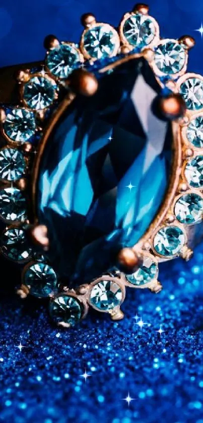 Elegant blue gemstone surrounded by diamonds on a glittery blue background.