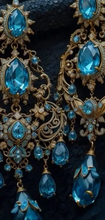 Elegant blue gemstone earrings with intricate gold designs.