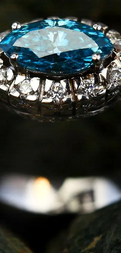 Close-up of a dazzling blue gemstone ring with diamonds on a dark background.
