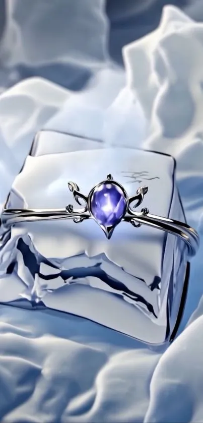 Blue gemstone ring on icy background.