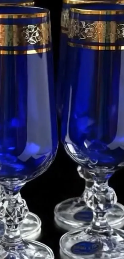 Elegant blue glasses with gold accents.