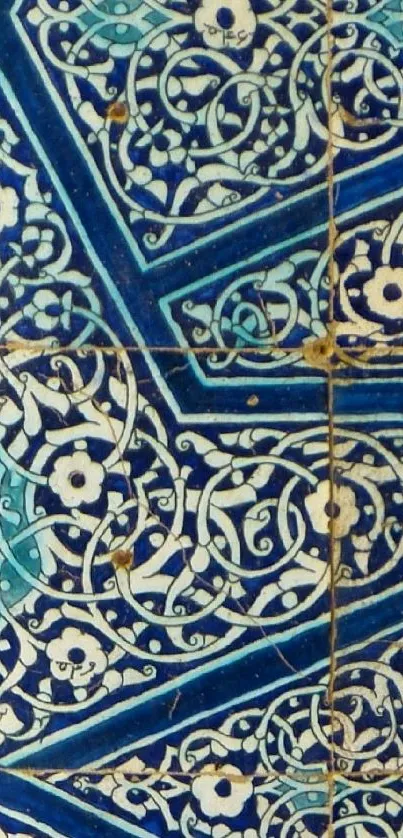 Intricate blue mosaic tile pattern with floral elements.