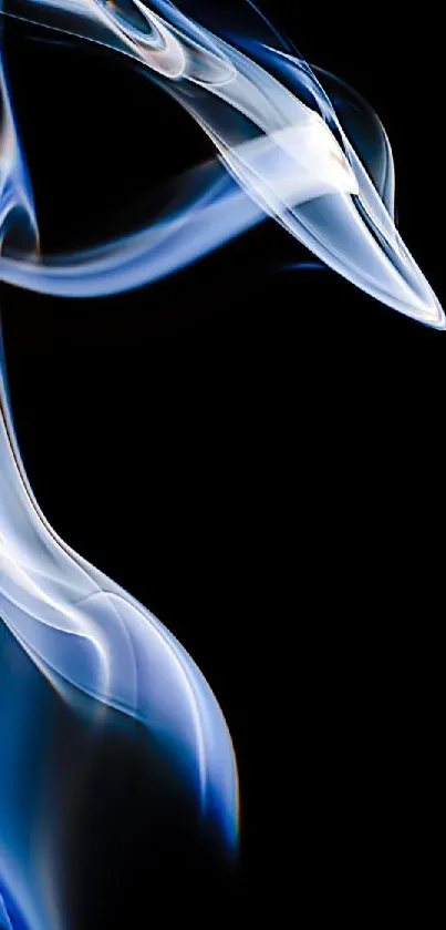 Blue ethereal smoke on a black background, creating an elegant and abstract visual.