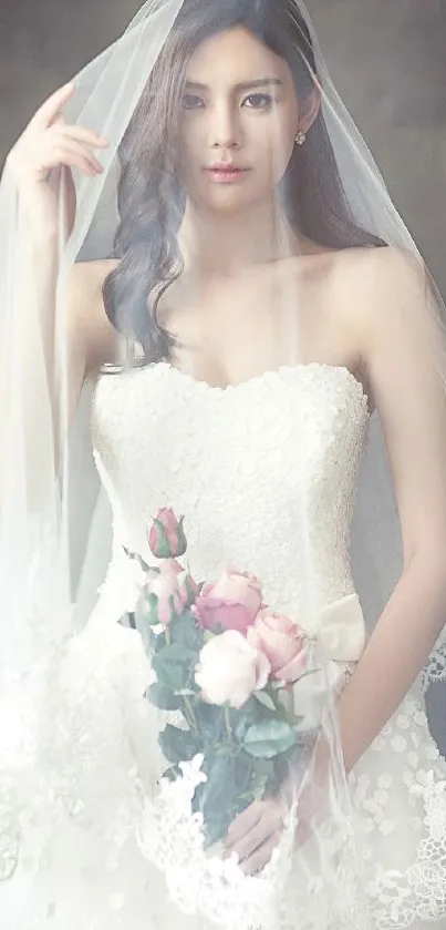 Bride in white dress with lace veil and bouquet.