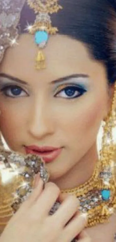 Elegant portrait of a bride in jewelry with blue makeup and golden accents.