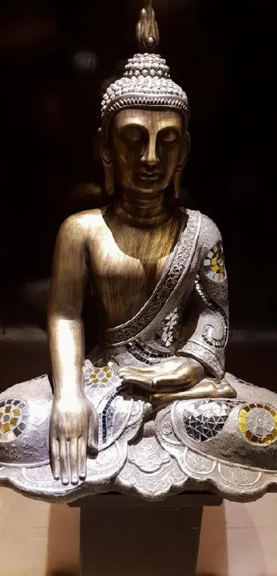 Bronze Buddha statue on dark background.