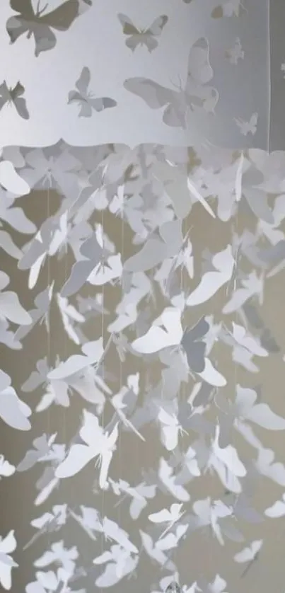 White paper butterflies dangling elegantly in a minimalist design.