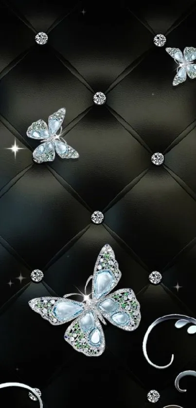 Elegant mobile wallpaper with jeweled butterflies on black quilted background.