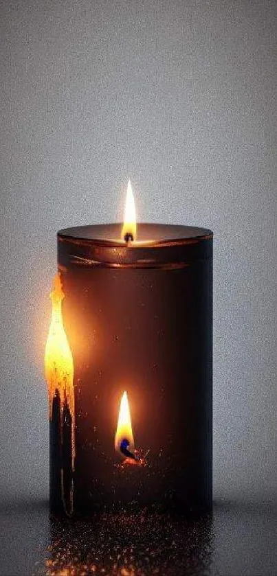 Elegant candle glowing with soft light against a grey background.