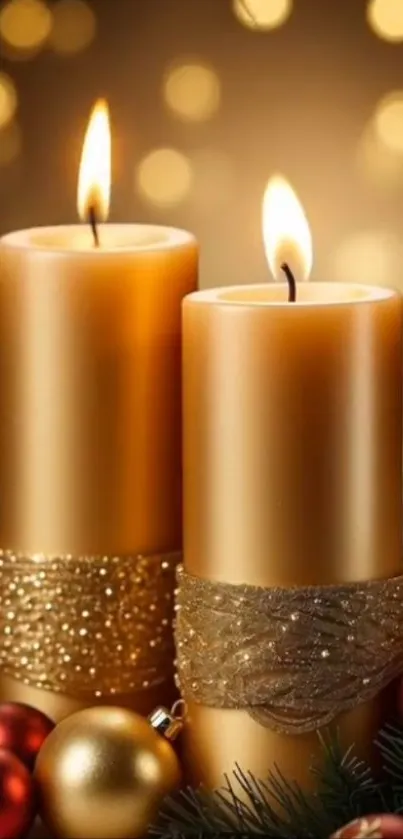 Elegant golden candles with festive Christmas decorations.