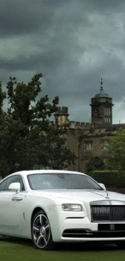 Luxury white car parked near a historic castle under cloudy skies.