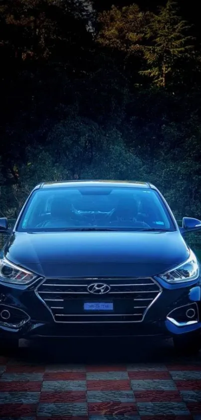 Front view of an elegant dark blue car in high-resolution wallpaper.