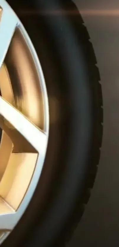 Close-up of a golden car wheel with sleek design.