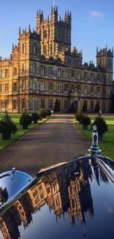 Reflection of a majestic castle on a car bonnet.