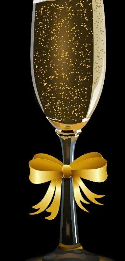 Champagne glass with gold bow on black background.