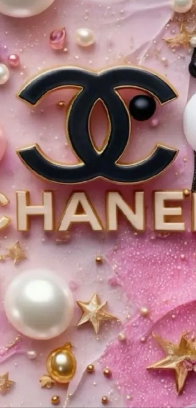 Chanel-themed wallpaper with pearls and gold accents on pink background.