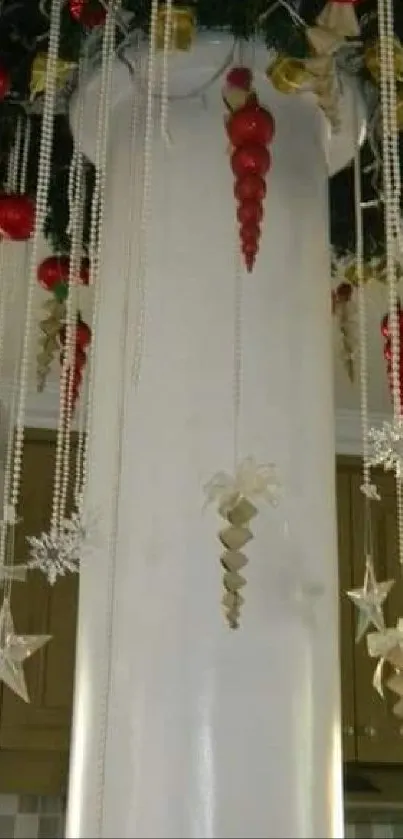 Holiday-themed ceiling with red ornaments and garlands.