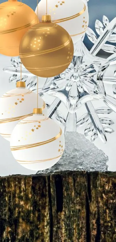 Golden and white ornaments with snowflake on a wooden stump.