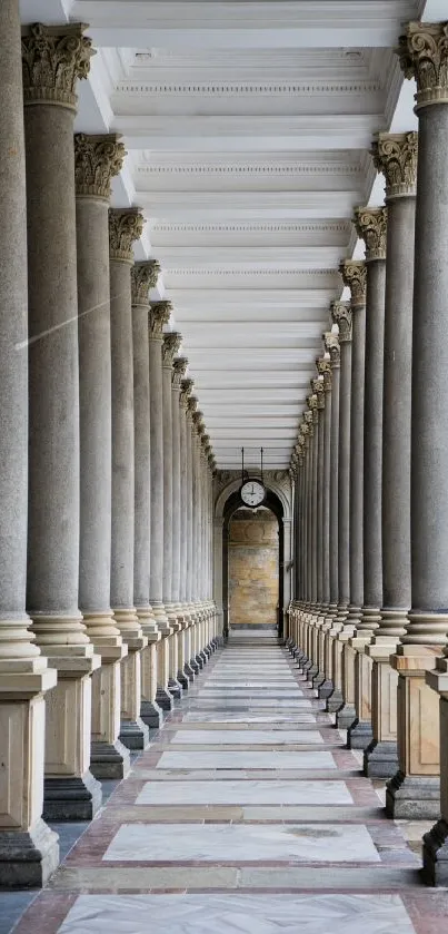 Elegant archway lined with stone pillars in classical style.