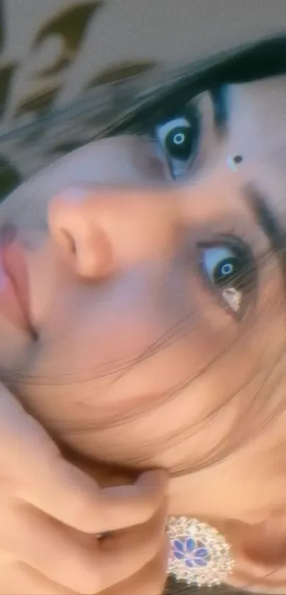 Close-up of a woman's face with elegant jewelry.