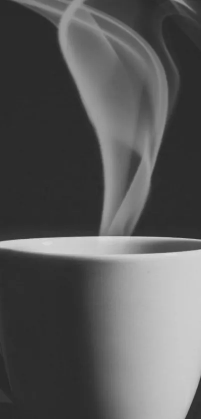 Steaming coffee mug in black and white, perfect for minimalistic aesthetics.