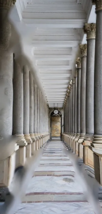 Elegant architectural corridor with stone columns.