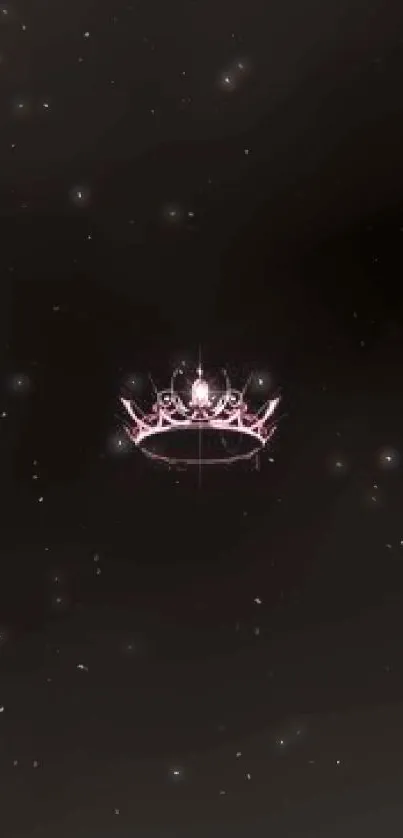 Pink crown on dark background, elegant mobile wallpaper.