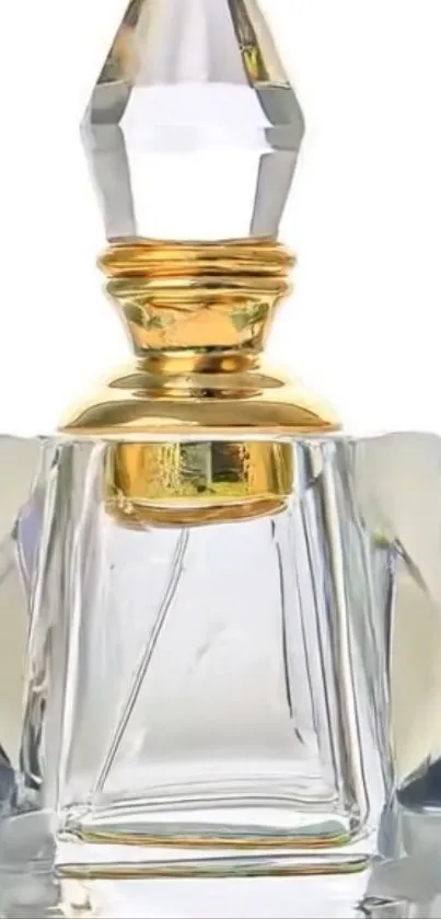 Elegant crystal perfume bottle with gold accents.