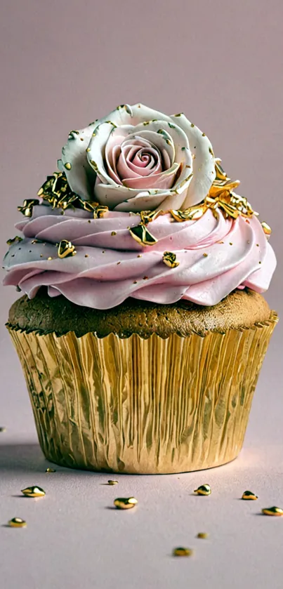 Rose-topped cupcake with gold wrapper wallpaper.