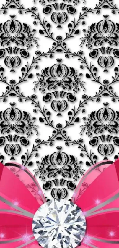 Elegant damask wallpaper with pink bow and diamond accent.