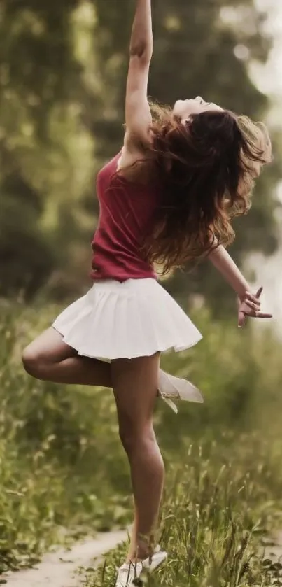 A dancer gracefully poses outdoors surrounded by lush green nature.