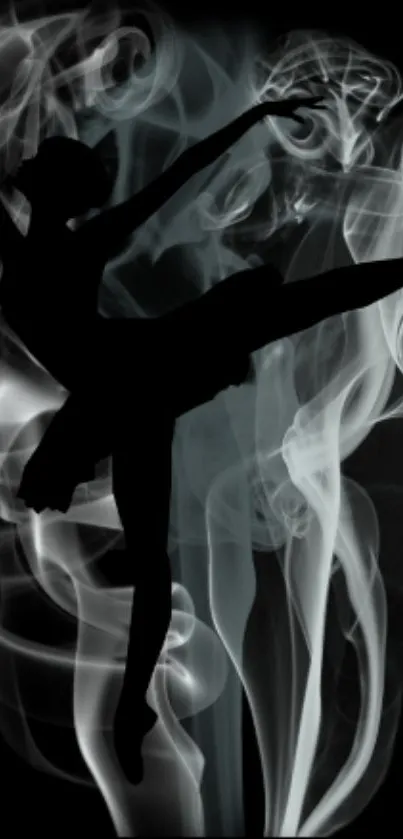 Silhouette of a dancer against swirling smoke.