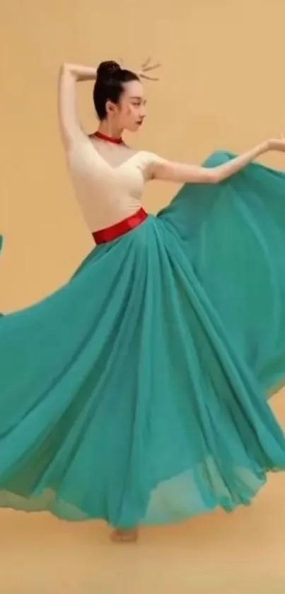 Elegant dancer in teal flowing dress twirling gracefully.