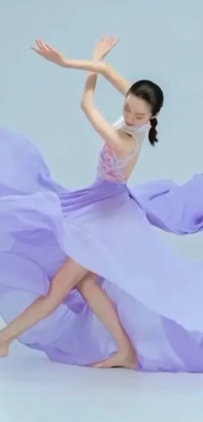 Elegant dancer gracefully twirling in a flowing lavender dress.