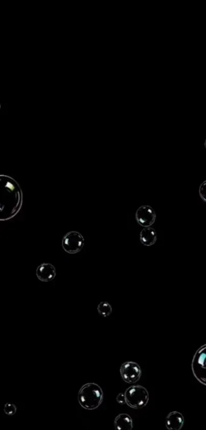 Dark wallpaper with floating bubbles on a black background.