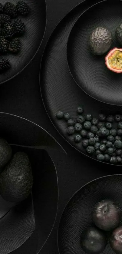 Elegant dark wallpaper with fruits on black plates.