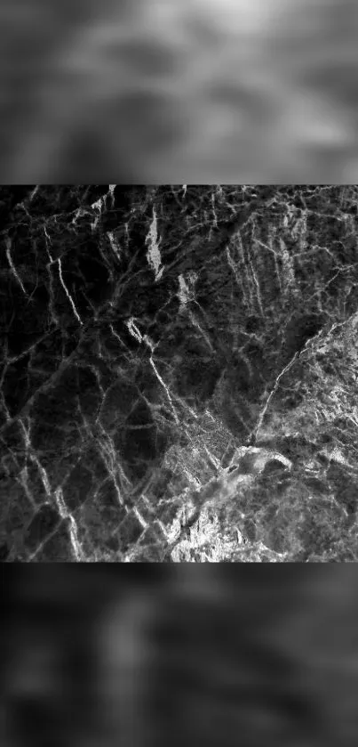 Elegant dark marble texture wallpaper with intricate patterns.
