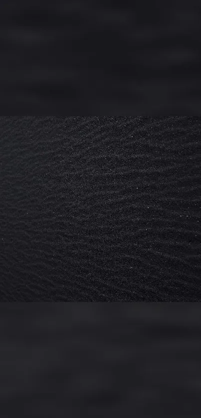 Dark sand texture mobile wallpaper with minimalist design.