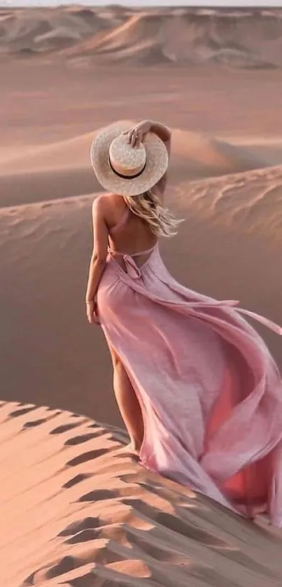 Woman in pink dress walking through scenic desert landscape.