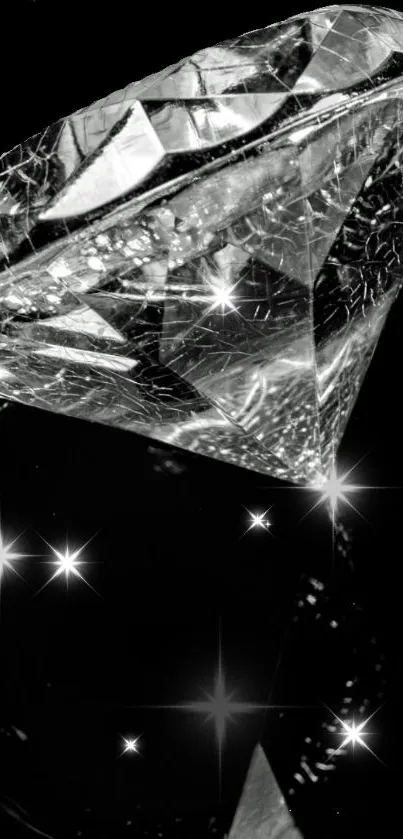 Sparkling diamond on a black background wallpaper.