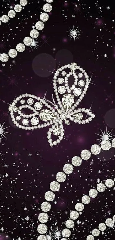 Diamond butterfly and beads on purple starry background.