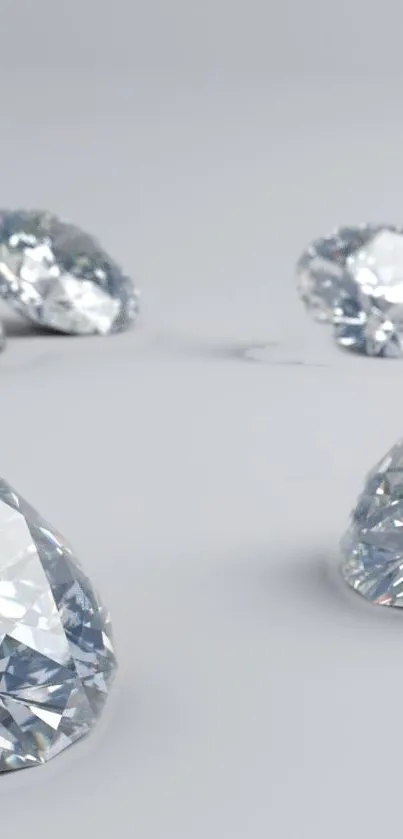 Mobile wallpaper featuring sparkling diamonds on a smooth gray background.